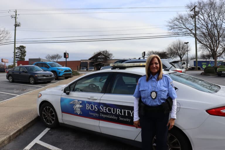 security woman and car