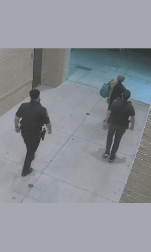 Police escort the trespasser off of the property and bar him from returning.