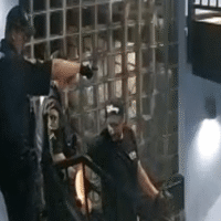 The ACCPD Officers direct the man down the stairs and out of the parking deck. The ACCPD Officers direct the man down the stairs and out of the parking deck.