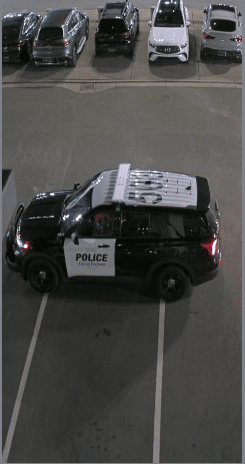 Police arrive on scene after the stolen vehicle was retrieved to gather more information about the incident.